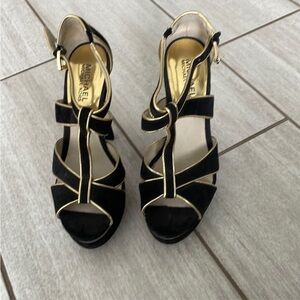 Michael Kors Black and Gold Women's Sandals
In great condition